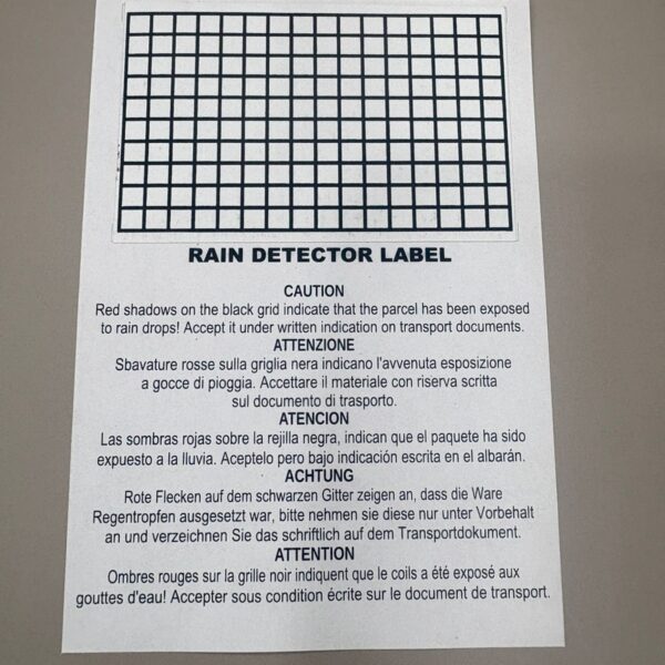 Rain detector label in dry unactivated state with plain black grid