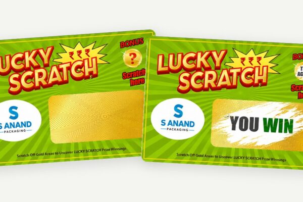 Promotional scratch cards with gold scratch-off panels, one unscratched and one revealing a prize message.